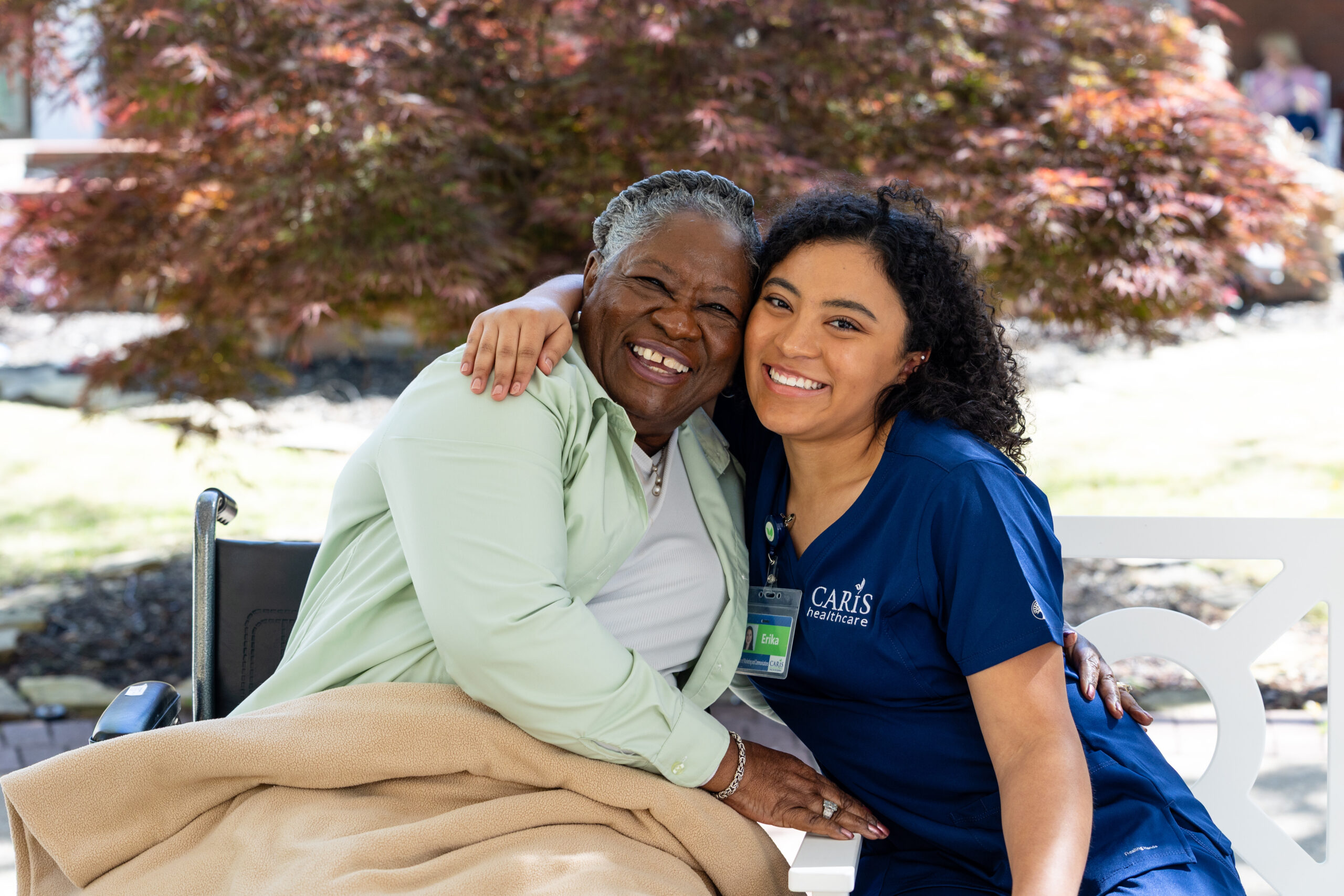 Hospice patient with nurse outside